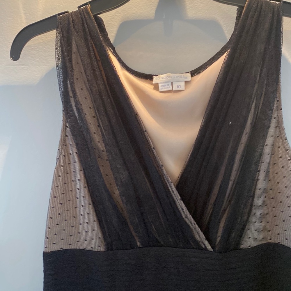 Black sleeveless dress by London Time.